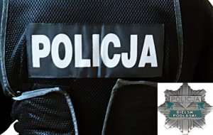 Napis POLICJA i odznaka z napisem POLICJA BIELSK PODLASKI